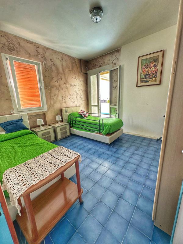 Camera doppia con letti attrezzati a Villa Romana