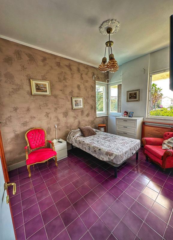 Camera singola con poltrone a Villa Romana